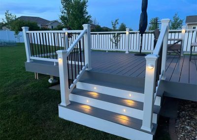 Grey and white deck with lights